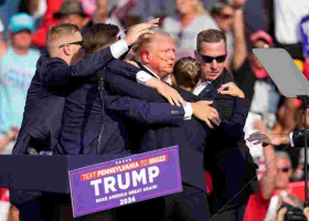 Bloodied Trump Evacuated as Gunfire Erupts at Pennsylvania Rally