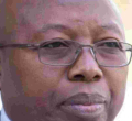 Former Chief Government Pathologist Alex Olumbe Dies in Australia