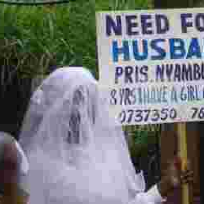 Placard-Carrying Nairobi Woman in Search of Husband Re-Unites with Father after 22 Years