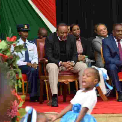Kenya's First Female Aide-de-Camp RN Kamui Accompanies President Uhuru to a Public Event