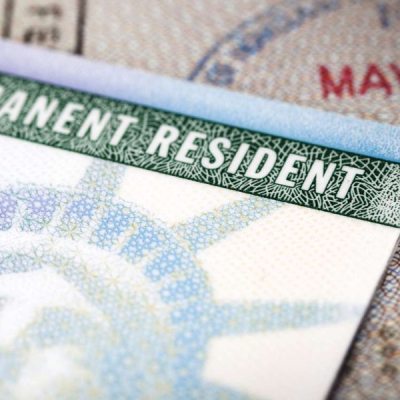 Without Warning, Government Cuts Funding for Green Card Holders Seeking Citizenship