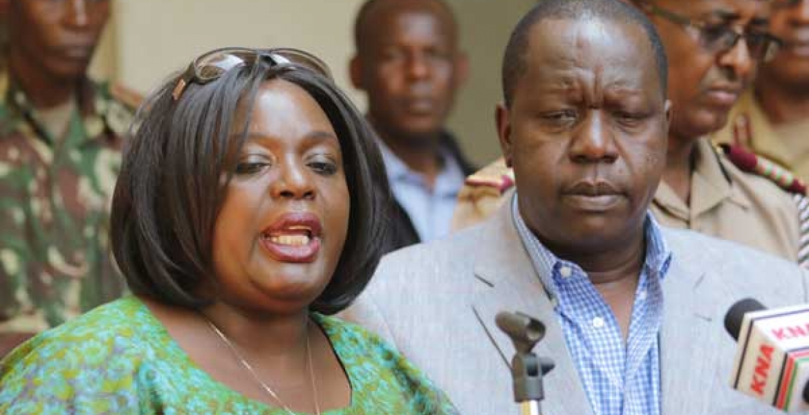 Defence Cabinet Secretary Raychelle Omamo (l) and acting Interior CS Fred Matiang’i at a press briefing on Saturday Kenya Government Fights Military Rigging Claims