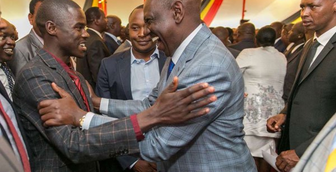 Deputy President William Ruto with Igembe South MP John Paul Mwirigi during the Jubilee parliamentary group meeting at State House, on August 30, 2017. PHOTO | PSCU Broke MP Rides in Matatu to State House Meeting