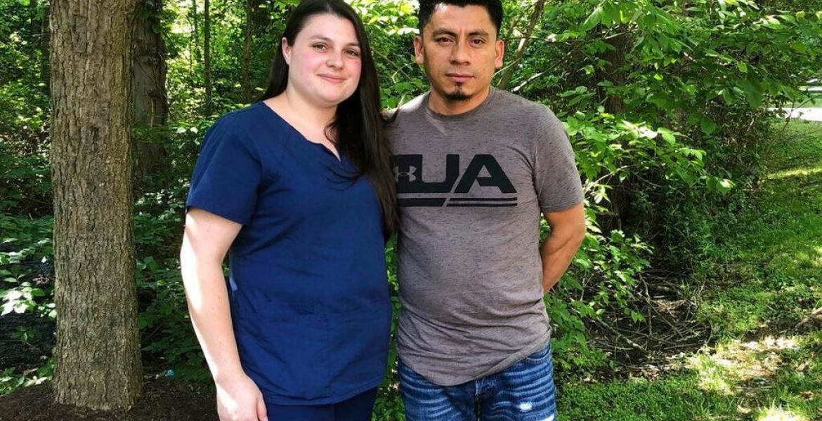 In a photo taken June 21, 2019, Alyse Sanchez and her husband, Elmer Sanchez, pose for The AP in Sandy Spring, Md. DHS Using Marriage-Based Green Card Interviews as Bait to Arrest Immigrants, Federal Lawsuit in Baltimore Claims