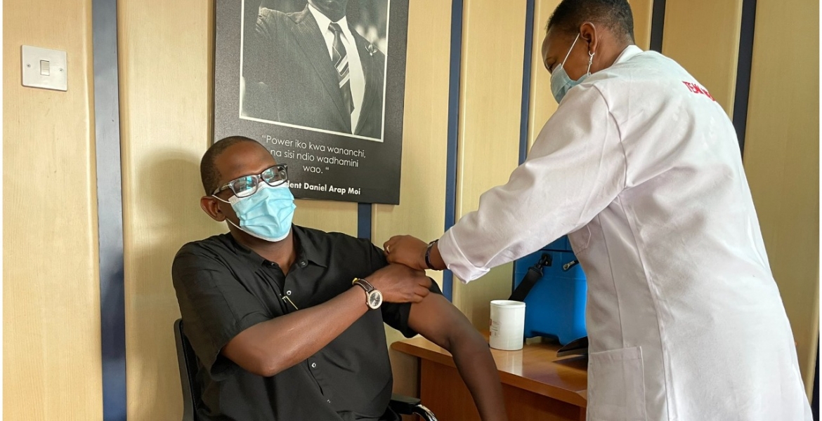 Nzioka Waita receives COVID-19 vaccine Uhuru Directs Cabinet Members to Take COVID-19 Vaccine
