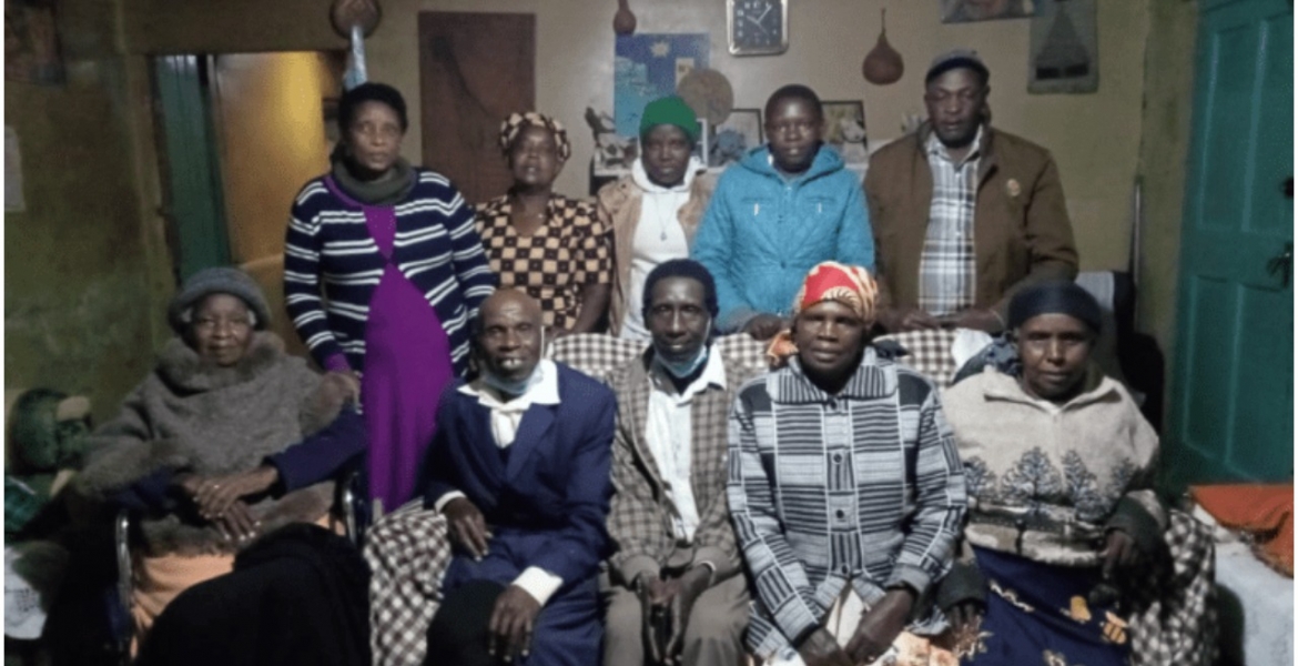 James Mwaura (in blue suit) with his family in Molo How Facebook Helped Kenyan Man Who Disappeared 47 Years Ago Reunite with Family