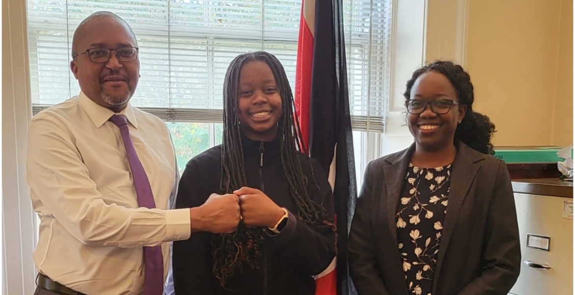 Kenya’s Deputy Head of Mission to UK Kiarie Kamere (L) and Kayla Bosire (C) Kenyan Student Wins Prestigious Queen’s Commonwealth Essay Competition