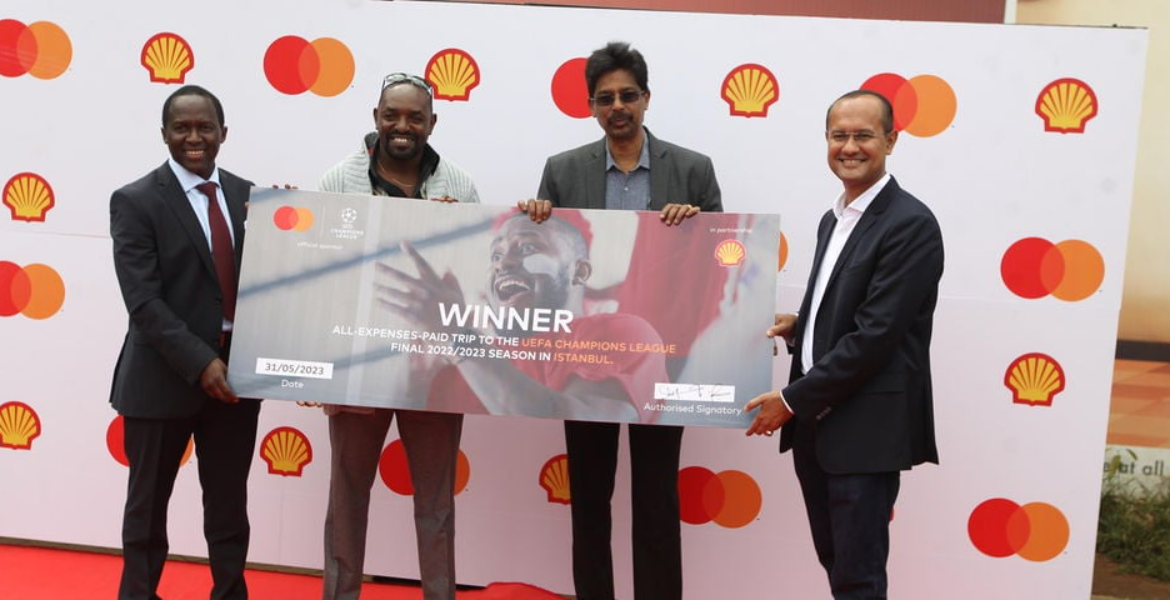 Vivo Energy Kenya MD Peter Murungi (Left), Raymond Maranga (Second Left) Jaison Jose (Second Right) Shehryar Ali, Mastercard Country Manager Two Kenyan Fans Win Ticket to Watch Champions League Final