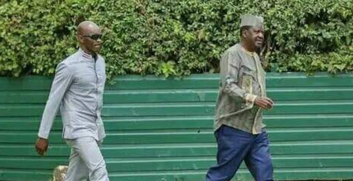 ODM Leader Raila Odinga (In a Navy Blue Trouser) With His Private Bodyguard Maurice Ogeta During a Past Function Raila's Bodyguard Abducted by Plaincloth Cops, Says Etale