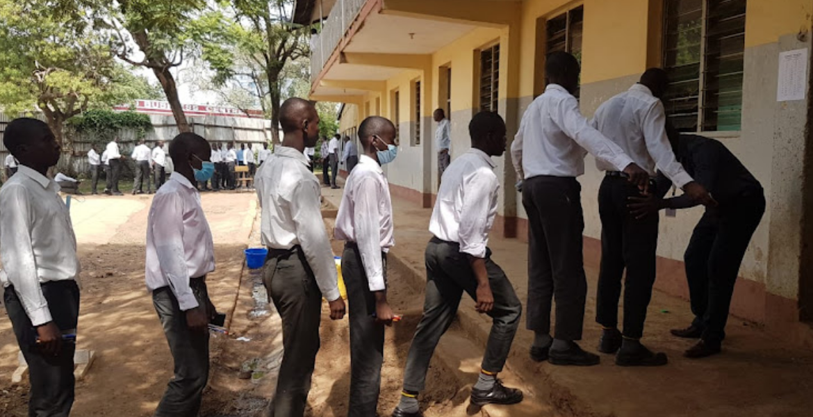 An Invigilator Screens KCSE Candidates New KCSE Grading System Raises Mixed Reactions