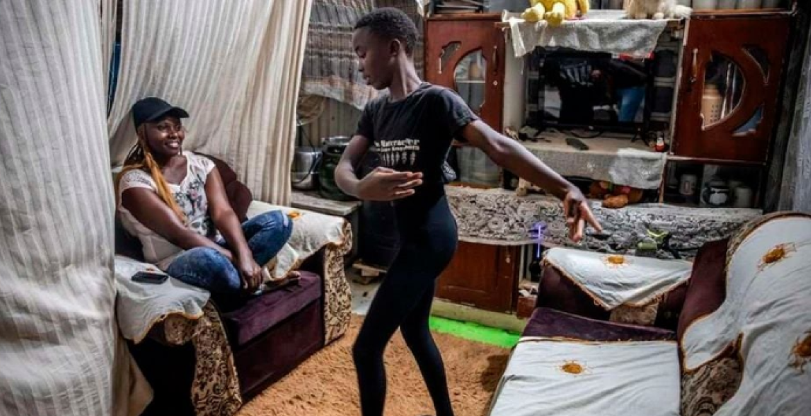 Dance Centre Kenya Student Bravian Mise, 13, (centre) Shows Some Dancing Moves to his Mother Rehema Mwikali, 34, (left) The Beauty of Ballet Blooms in Kibera