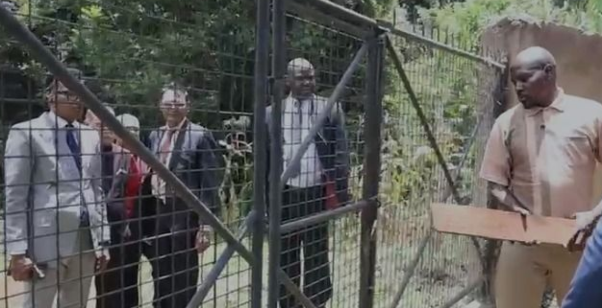 Man Breaking Down a Gate Cabinet Secretary Wahome Briefly Locked in Loresho Land Standoff, Two Arrested