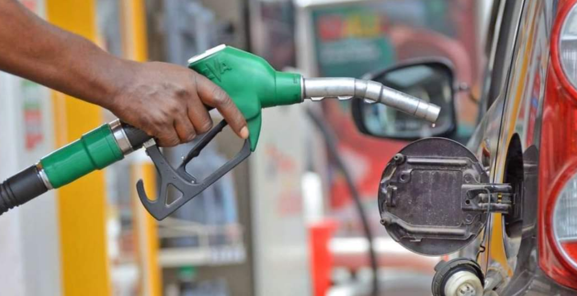 A Fuel Attendant Holding a Fuel Pump at the Filling Station Petrol Prices Fall Sh7 as Kenya Shilling Strengthens