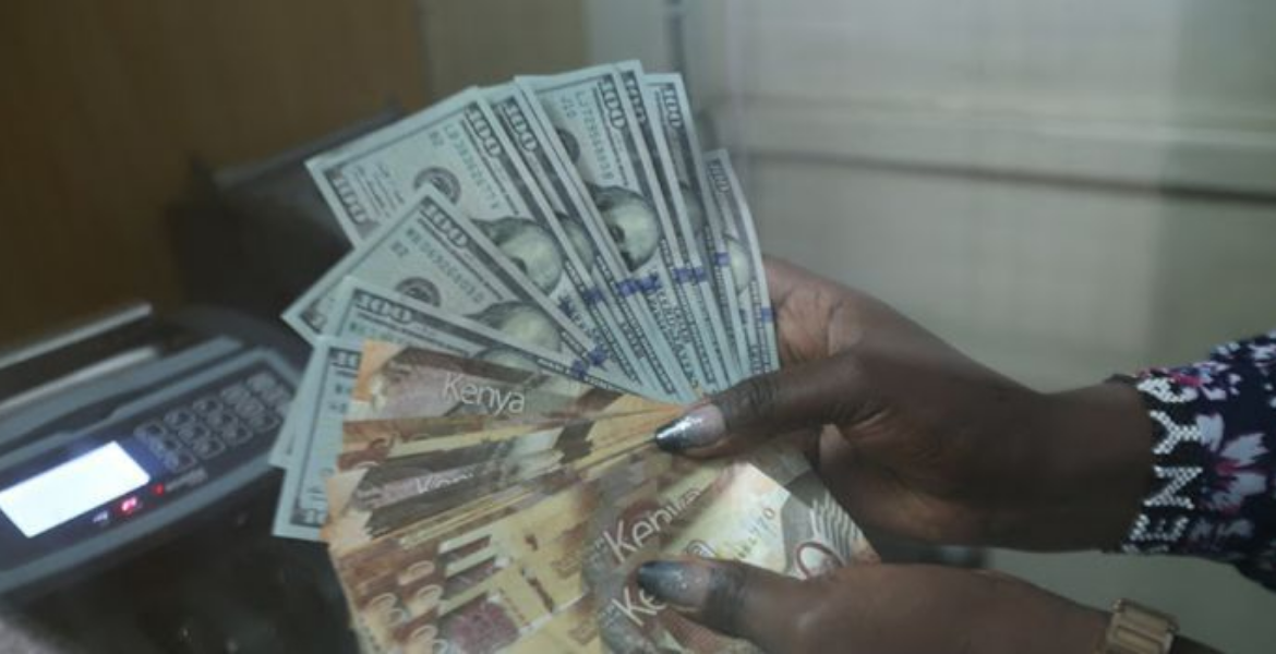 A Cashier at a Nairobi Forex Bureau Counts Dollars and Shillings Shilling Bounces Back, Recoups Half the Value Lost
