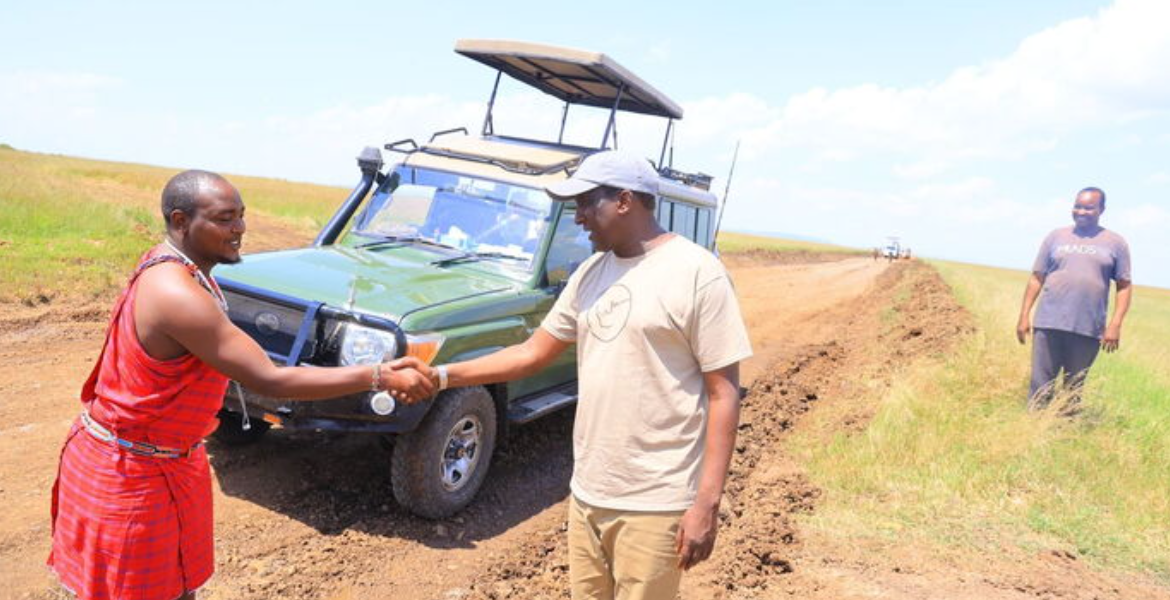 Narok Governor Patrick Ole Ntutu and a tour guide at Maasai Mara Maasai Mara Implements Strict Regulations to Curb Disruptive Parties by Private Vehicle Users
