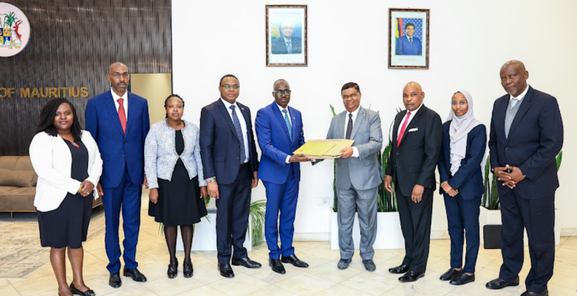 Foreign affairs PS Korir Singo'ei with other officials submitting requisite documentation for Raila's bid for AUC chairmanship Kenya Submits Raila's Official Documentation for AUC Seat