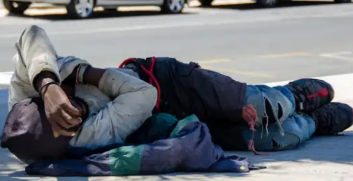 A Homeless Man Sleeping on the Pavements Across a Street Man Rescued from Dubai Ends Up Homeless in Kenya