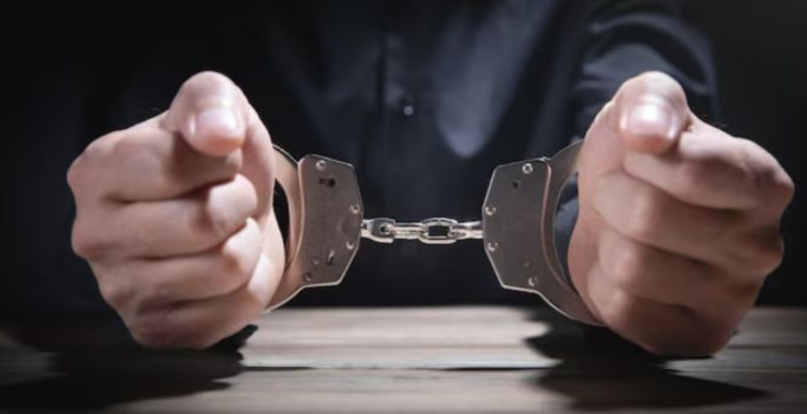 Man in Handcuffs Ex-French Spy Arrested in Strasbourg for Orchestrating Child Rapes in Kenya
