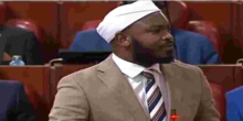 MP Kicked Out of Parliament for Wearing 'Church' Headgear