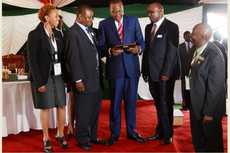 Members of the Board of the Kenya USA Diaspora SACCO with President Kenyatta at a luncheon they hosted in honor of  participants  of Diaspora Conference held at Windsor Golf and country club in April, 2015.