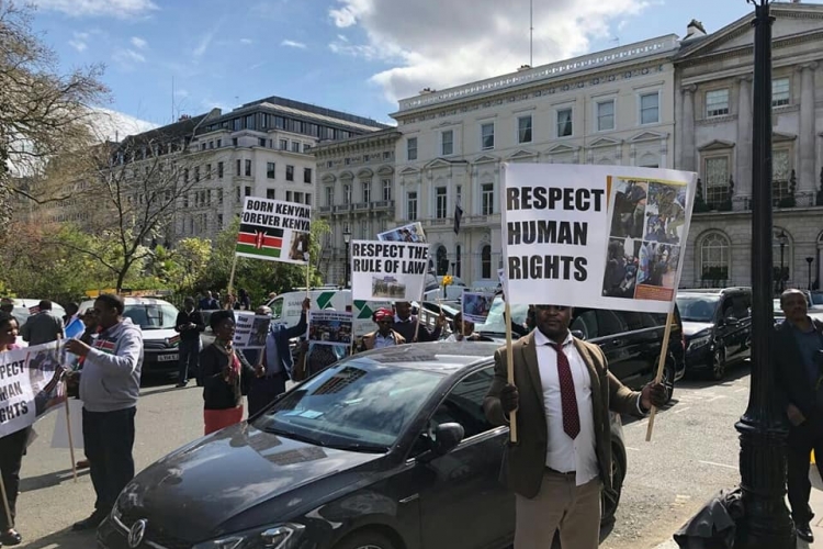 Kenyans in London Demonstrate Outside Chatham House Where President Kenyatta Delivered a Talk